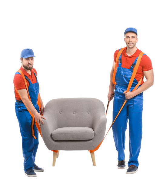 Loaders carrying furniture by using cargo belts on white background - Photo, Image
