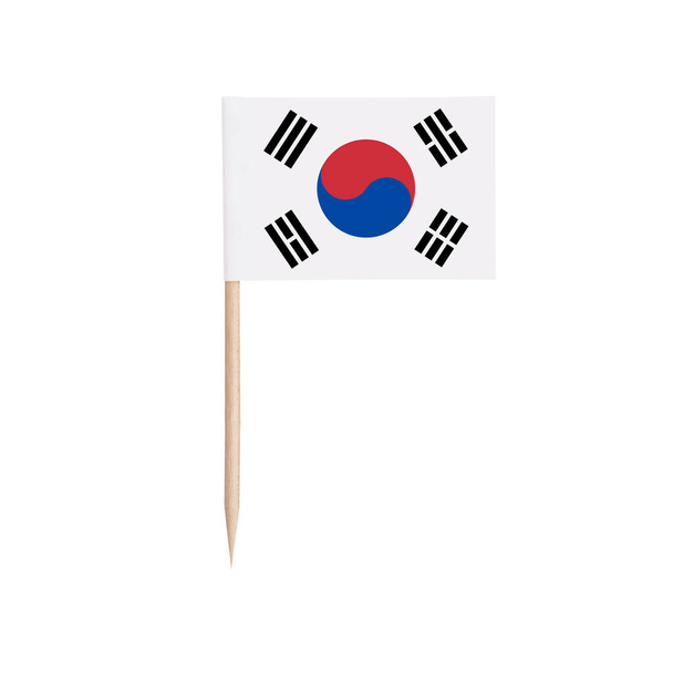 Miniature paper flag South-Korea. Isolated South Korean toothpick flag pointer on white background. - Photo, Image