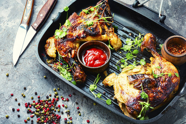 Appetizing chicken cooked in a grill pan.Popular meat food - Valokuva, kuva