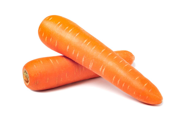 Fresh carrots isolated on white background. Close up of carrots. - Photo, Image