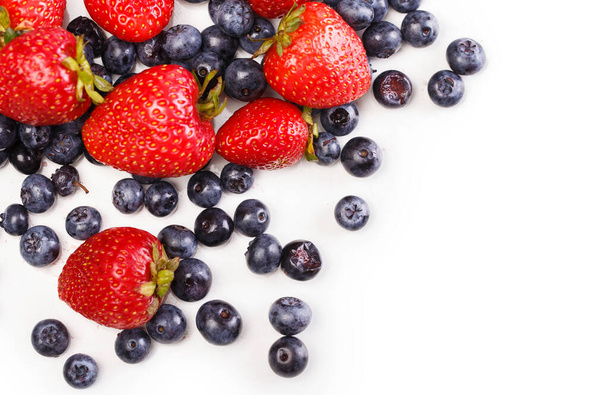 Food, nature. Heap of delicious berries on a white background - Foto, immagini
