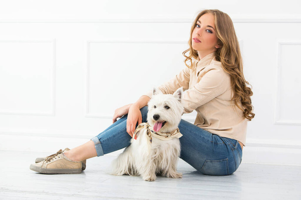 Attractive woman with dog - Foto, afbeelding