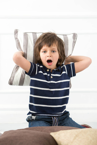 Cute, adorable boy with pillow - Photo, Image