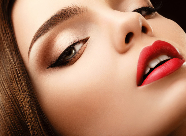 Woman Eye with Beautiful Makeup. Red Lips High quality image. - Φωτογραφία, εικόνα