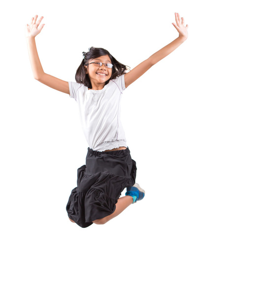 молода азіатська дівчина стрибає
 - Фото, зображення