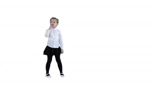 Cute happy girl singing into imaginary microphone on white background. - Footage, Video