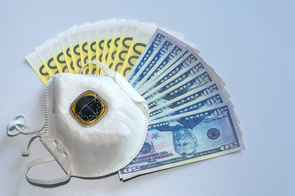 Respirator on the background of paper money - Fotó, kép
