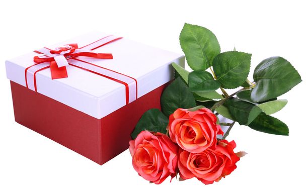 Beautiful gift box with flowers isolated on white - Photo, Image