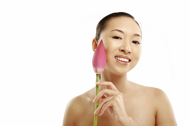 Woman posing with a flower - Photo, Image