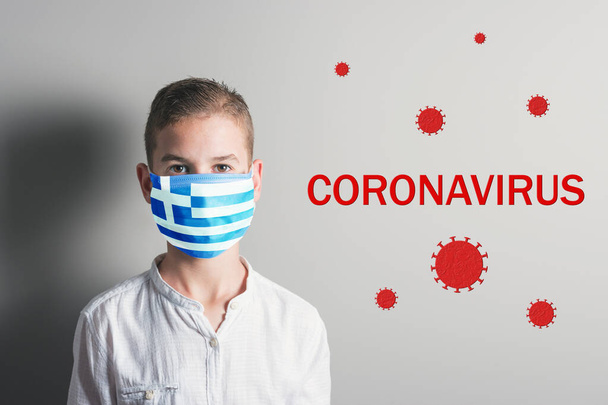Boy in a medical mask with flag of Greece on his face on bright background. Epidemic virus 2019-nCoV Respiratory Syndrome. Medicine concept. - Foto, imagen