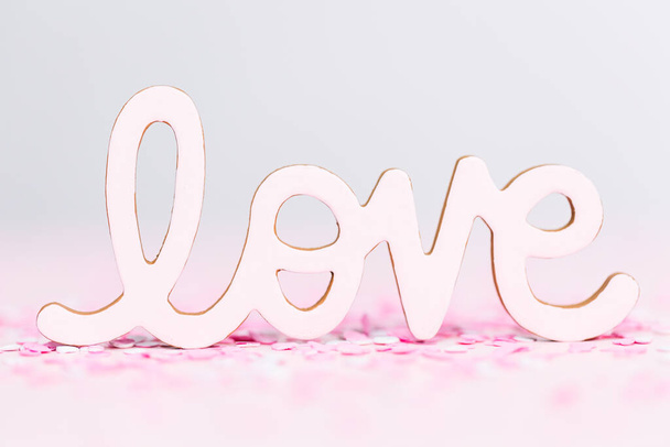 Valentine's Day LOVE sign on a pink background. - Foto, Imagem