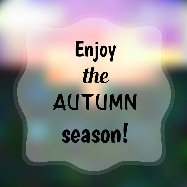 Enjoy the autumn season! Inspirational quote on blurred background. - Vector, Image