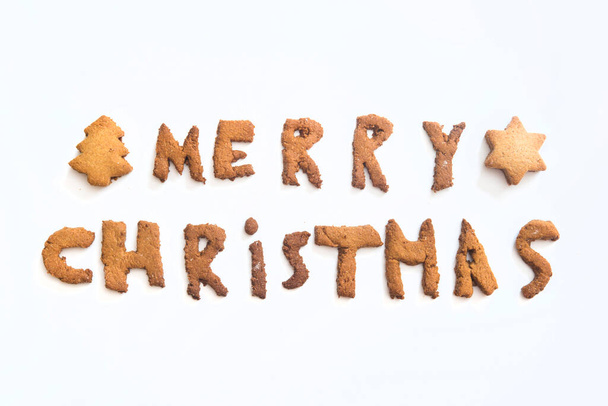 Christmas cookies with the letters Merry Christmas 2021 - Фото, изображение