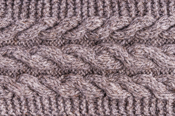 Texture tricotée gris laine. Tissu gris laine, fait à la main. Ornement textile. Tricots de mode. Fil de laine léger. Texture du tissu. Foulard d'hiver. Modèle sans couture. Gros plan
 - Photo, image