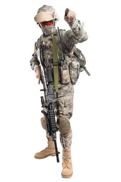 Male in US Army uniform soldier (Flag of the USA on the shoulder). Shot in studio. Isolated with clipping path on white background - Фото, изображение