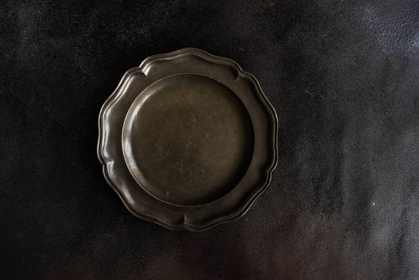 Empty bowl as a table setting concept on stone background with copy space - Fotografie, Obrázek