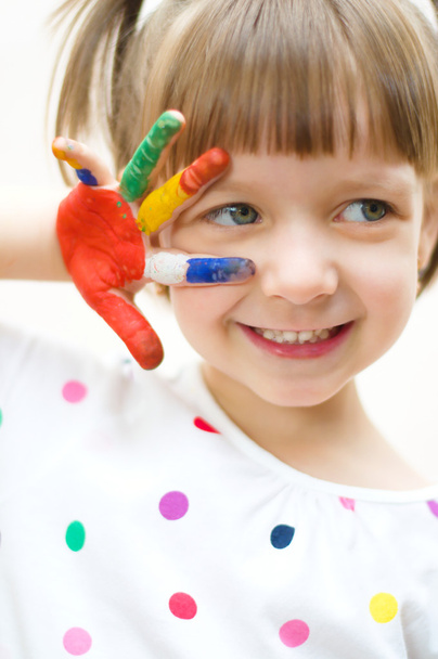 child with painted hands - Zdjęcie, obraz