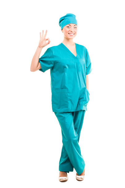 Young woman nurse or doctor cheerful and joyful isolated - Fotó, kép