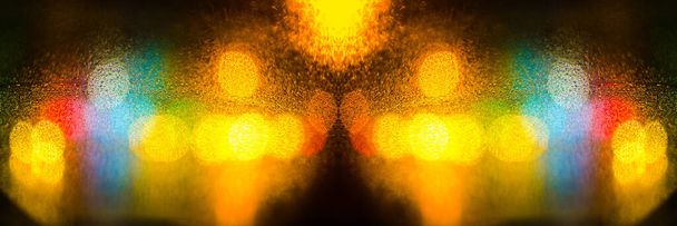 Colorful defocused bokeh lights background. City glare abstract background. - Photo, Image