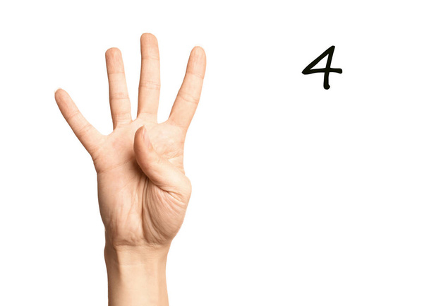 Woman showing number four on white background, closeup. Sign language - Fotografie, Obrázek