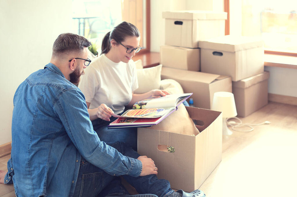 Young couple moving in to new home together - Photo, image