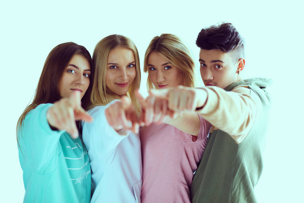 Young people pointing at you standing together - Fotoğraf, Görsel