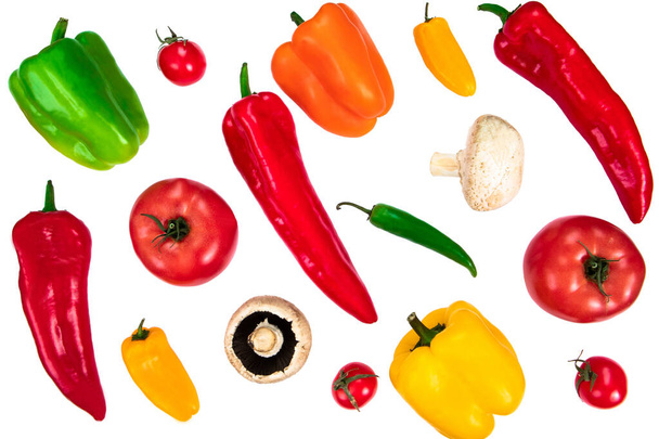 Collection of various vegetables: tomatoes, bell peppers of different colors, mushrooms, mini sweet peppers, cherry tomatoes and kapia peppers isolated on white background. Healthy food - Photo, Image