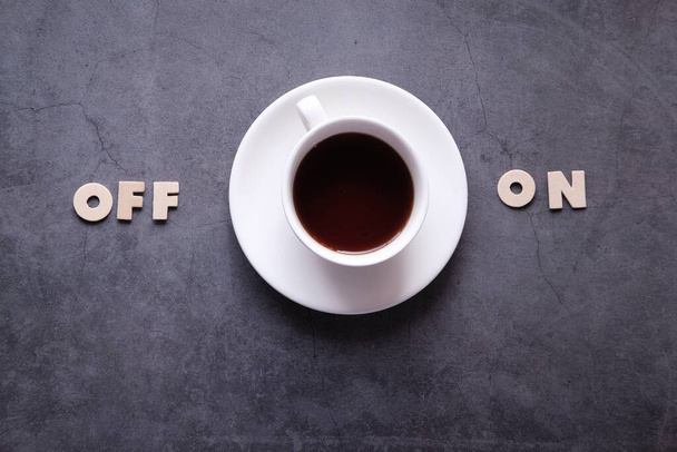 Cup of coffee and text ON and OFF - Foto, imagen