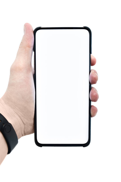 Mobile smartphone with a white display with a white background and copy space. People are showing cell phones - Photo, Image