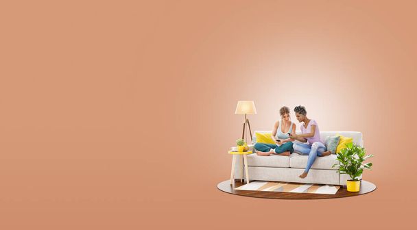 Cheerful girl friends talking and watching video or browsing on mobile phone online sitting on a couch at home. Unusual 3d illustration - Photo, image