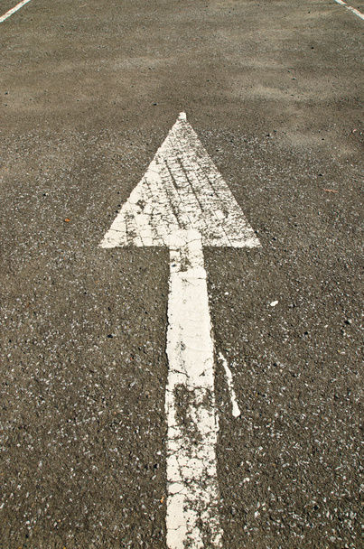 White old arrow on black road - Photo, Image