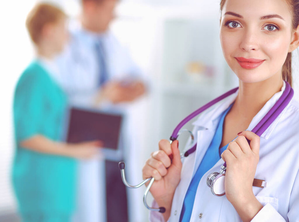 Woman doctor standing at hospital - Foto, Imagen