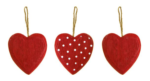три дерев'яні серця на білому фоні - Фото, зображення