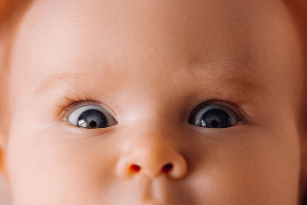 Baby eyes close up macro shooting. Newborn headshot - Foto, imagen
