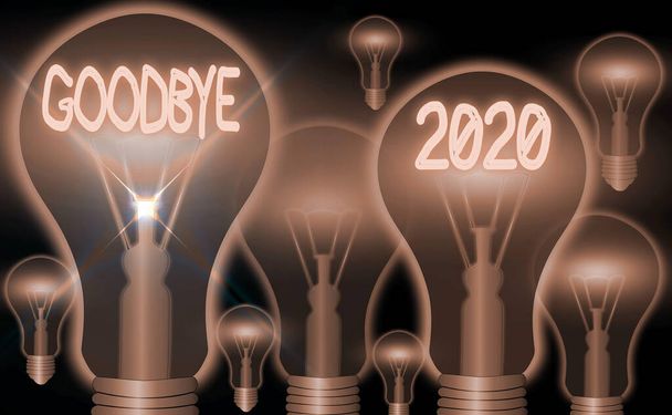 Текстовый знак "Прощай 2020". Концептуальное фото выражает добрые пожелания при расставании или в конце прошлого года
. - Фото, изображение