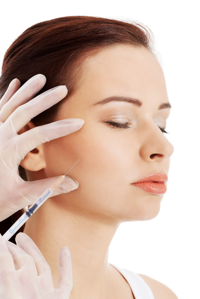 Beautiful woman's face is being prepareg to plastic surgery. - Fotografie, Obrázek