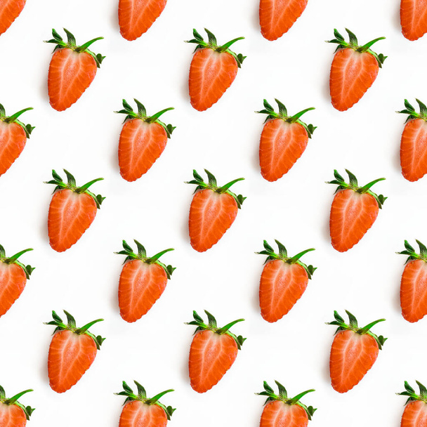 Photographic collage, seamless pattern with half red strawberry with green peduncle on a white background. Macro square image about fresh organic berries, harvets, healthy food and vitamin - Fotografie, Obrázek