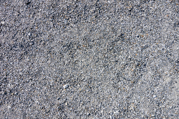 Top view of blue construction gravel texture background. Small granite stone full frame background. - Foto, imagen