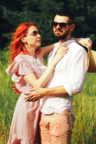 happy, couple in love cuddling, ginger girl. minute to kiss. date attraction and sexuality - 写真・画像