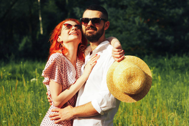happy, couple in love cuddling, ginger girl. minute to kiss. date attraction and sexuality - 写真・画像