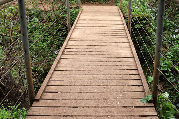 bridge - an artificial structure built in a city forest park in northern Israel  - Photo, Image