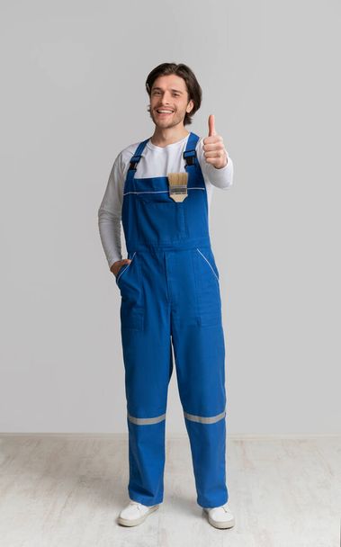 Professional House Painter In Work Uniform Gesturing Thumb Up - Photo, Image