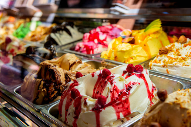 Ice cream in Rome, Italy. Italian gelateria. Ice-cream cafe, show window with sweeties. - Zdjęcie, obraz