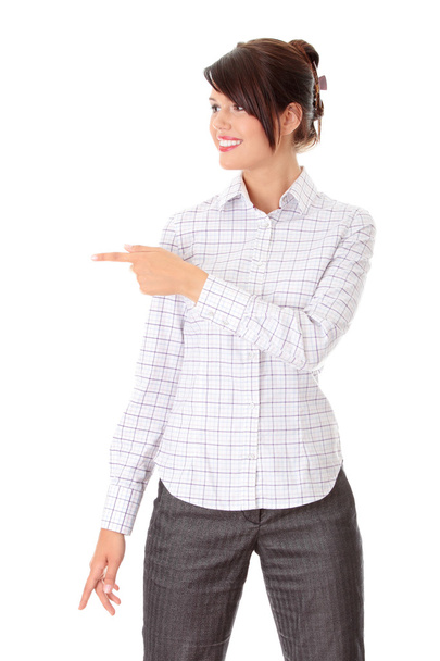 Young happy businesswoman pointing - Foto, Imagen