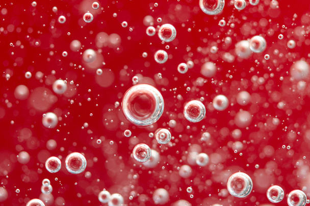 Air bubbles in a liquid. Abstract red background. Macro - Fotoğraf, Görsel