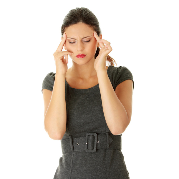Young business woman with headache - Photo, image