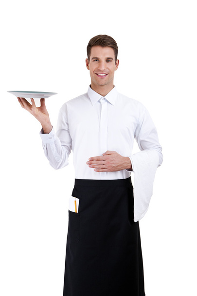 Camarero profesional sosteniendo un plato vacío. Aislado sobre blanco
 - Foto, imagen