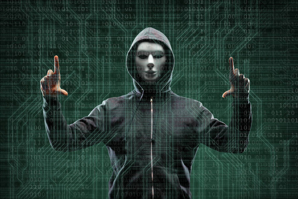 Hacker de computador anônimo sobre fundo digital abstrato. Cara escura obcecada em máscara e capuz. Ladrão de dados, ataque à Internet, fraude na darknet, vírus perigosos e conceito de segurança cibernética
. - Foto, Imagem