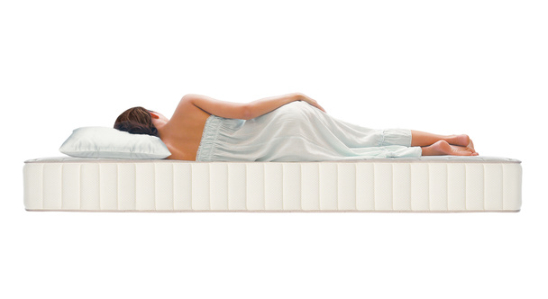 Ortopéd matracon alvó nő - Fotó, kép