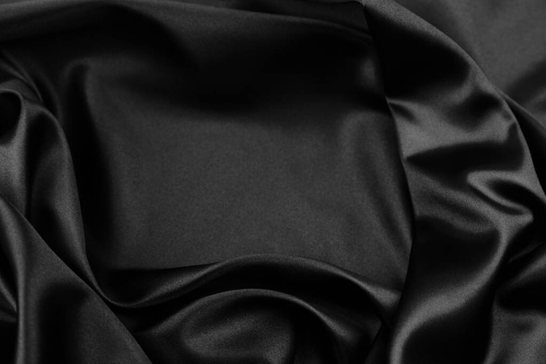 Closeup of rippled black silk fabric - Fotoğraf, Görsel